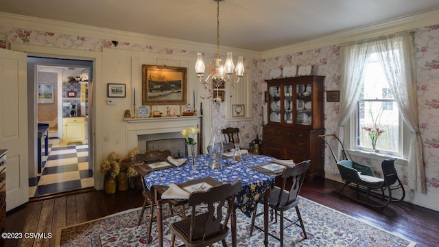 dining room featuring a notable chandelier, crown molding, and dark hardwood / wood-style floors