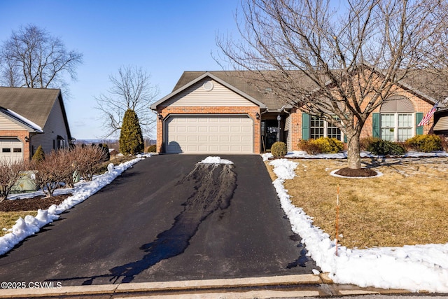 ranch-style home with a garage