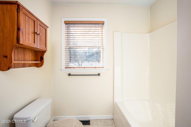 full bath with tile patterned floors, toilet, baseboards, and visible vents