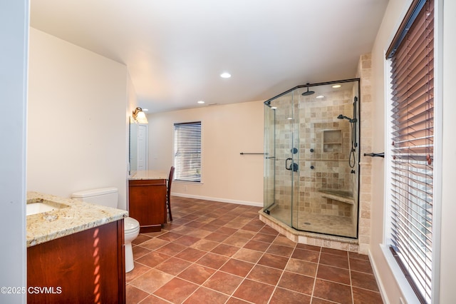 full bath featuring tile patterned flooring, a shower stall, toilet, recessed lighting, and vanity