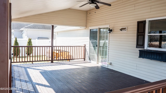 wooden deck featuring ceiling fan