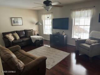 living room with ceiling fan and wood finished floors