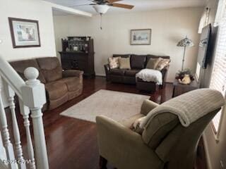 living room with ceiling fan and wood finished floors