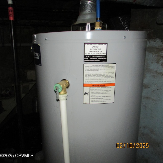 utility room featuring gas water heater