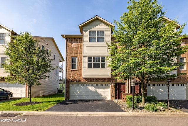 118 Jacobs Landing Way, Danville, PA 17821 - view of front of home featuring brick siding, driveway, and an attached garage