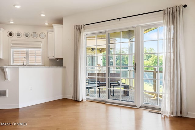 118 Jacobs Landing Way, Danville, PA 17821 - doorway to outside with wood finished floors and recessed lighting