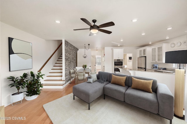 118 Jacobs Landing Way, Danville, PA 17821 - living area with light wood-type flooring, recessed lighting, stairs, and a ceiling fan