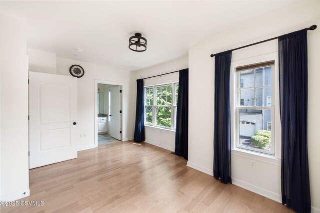 118 Jacobs Landing Way, Danville, PA 17821 - unfurnished bedroom with light wood-style floors and ensuite bathroom
