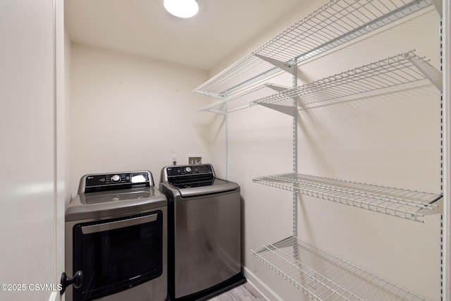 118 Jacobs Landing Way, Danville, PA 17821 - laundry area featuring separate washer and dryer and wood finished floors