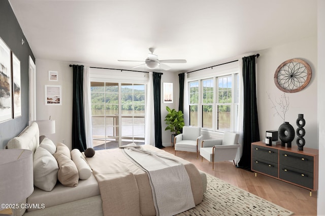 118 Jacobs Landing Way, Danville, PA 17821 - bedroom featuring light wood-type flooring, ceiling fan, and access to exterior