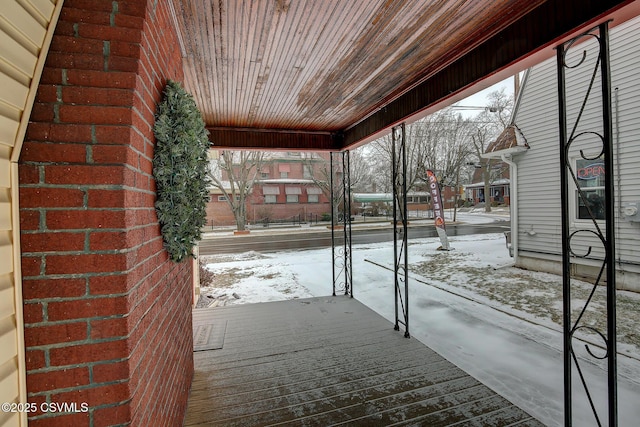 view of snow covered patio