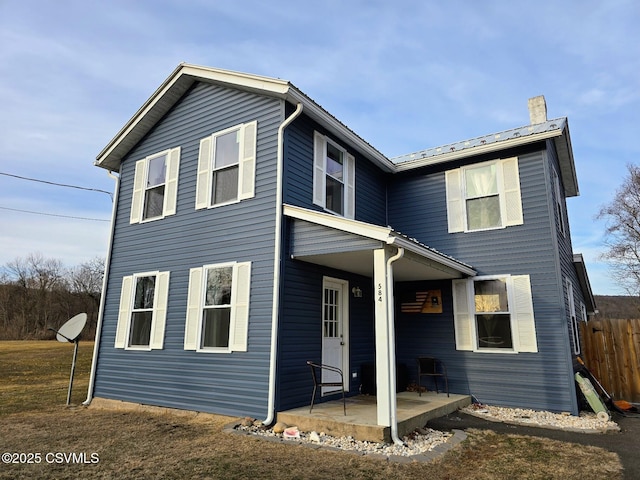 view of front of home with a patio area