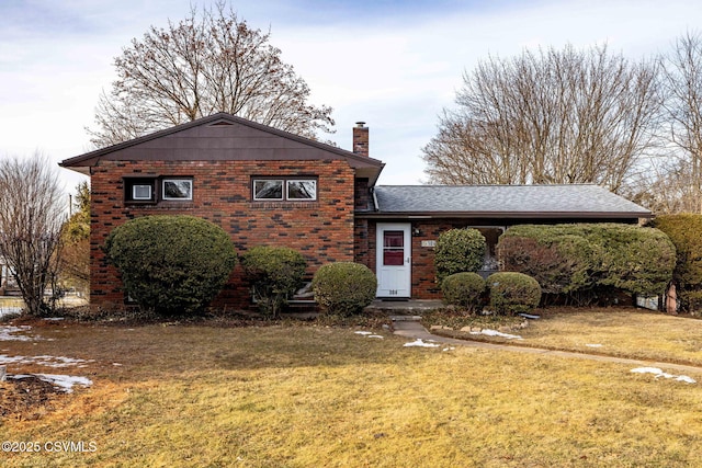 view of front of property with a front lawn