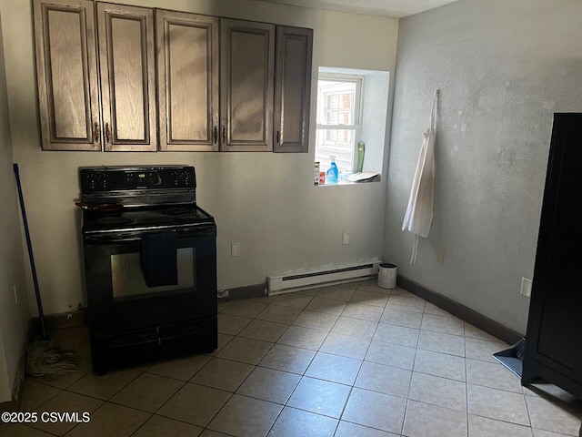 kitchen with light tile patterned floors, black / electric stove, baseboard heating, and baseboards