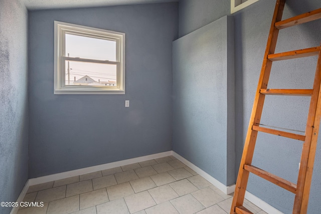 1041 Pine St, Kulpmont, PA 17834 - unfurnished room with light tile patterned floors and baseboards
