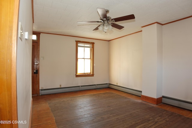 unfurnished room featuring ceiling fan, a baseboard heating unit, dark hardwood / wood-style floors, and ornamental molding