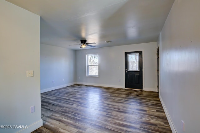 entrance foyer featuring a ceiling fan, baseboards, and wood finished floors