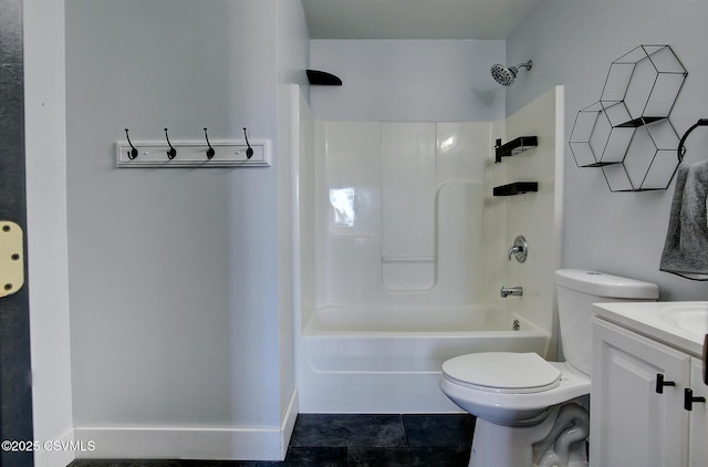 full bath featuring  shower combination, vanity, toilet, and tile patterned floors