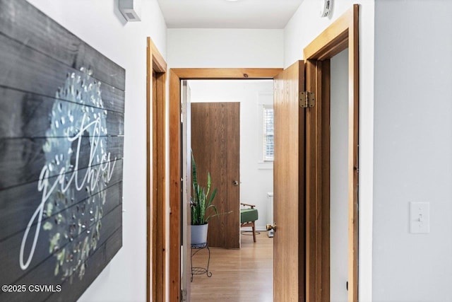 hall featuring wood finished floors