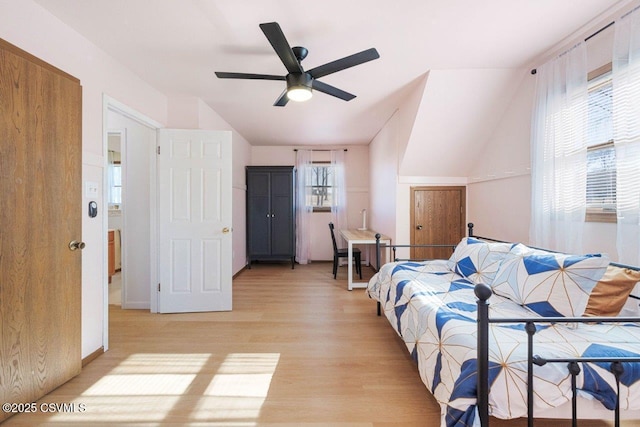 bedroom featuring light wood-type flooring and a ceiling fan