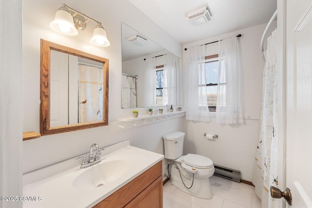 bathroom featuring a baseboard heating unit, toilet, vanity, and visible vents