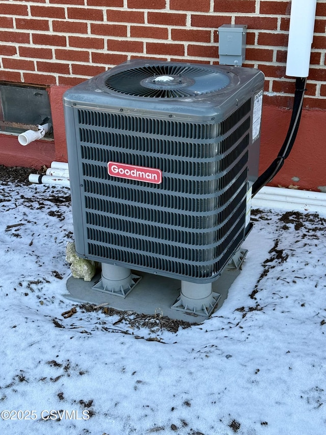 details with central AC and brick siding