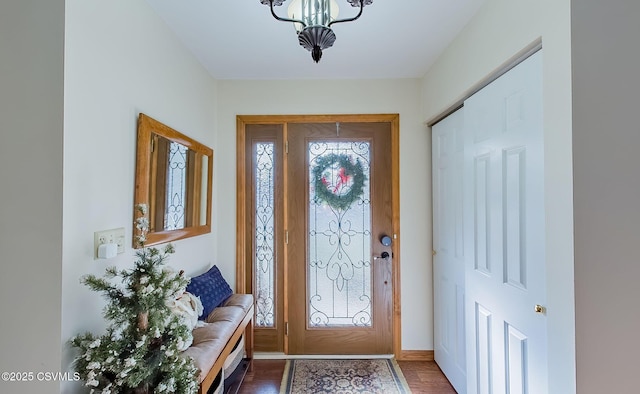 foyer featuring wood finished floors