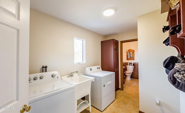 laundry room with laundry area and separate washer and dryer