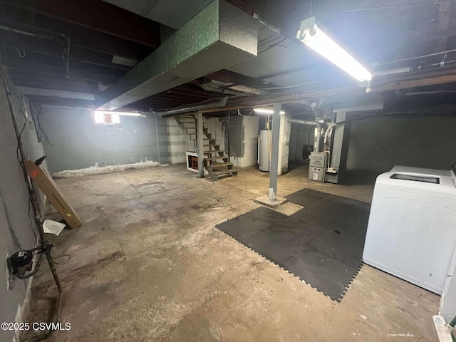 basement with washer / clothes dryer, water heater, stairway, and heating unit