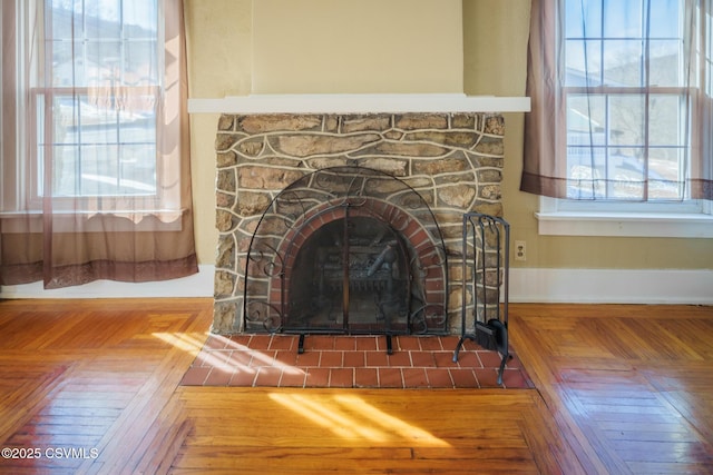 details with a stone fireplace