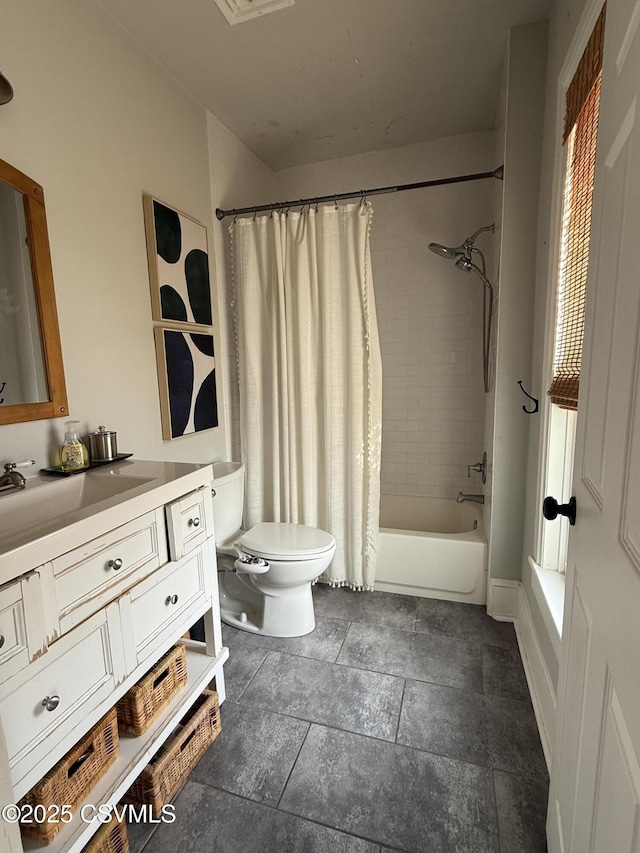 full bath with a healthy amount of sunlight, vanity, toilet, and shower / bath combo with shower curtain