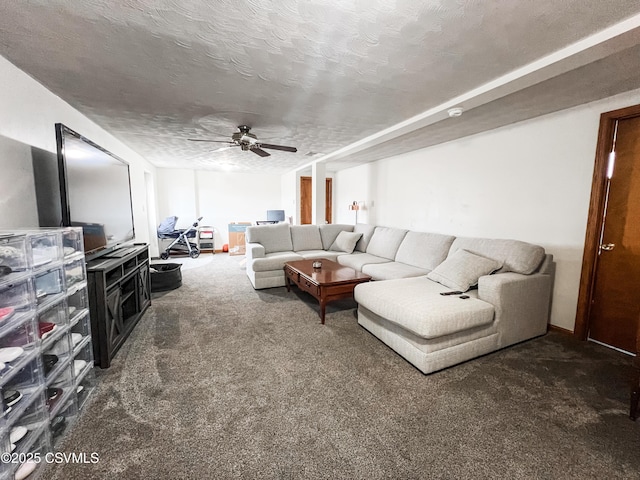 carpeted living room with a ceiling fan and a textured ceiling