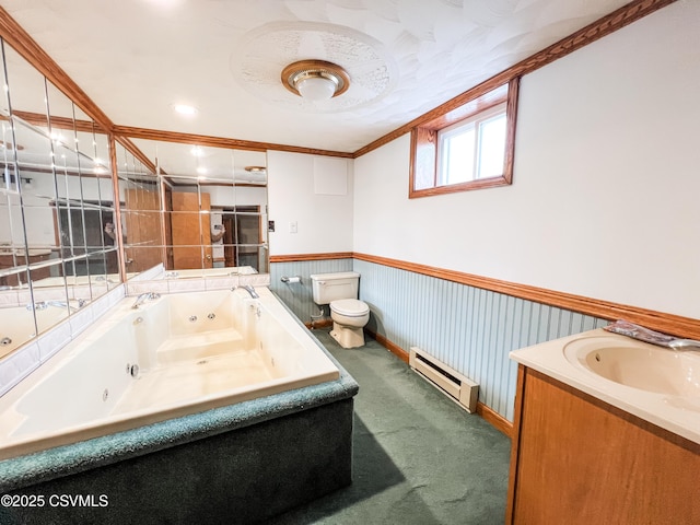 bathroom featuring crown molding, a baseboard radiator, toilet, wainscoting, and a tub with jets