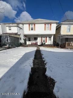 view of snow covered property