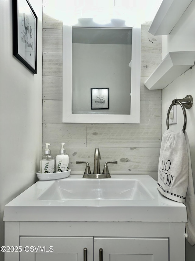 bathroom with backsplash and vanity