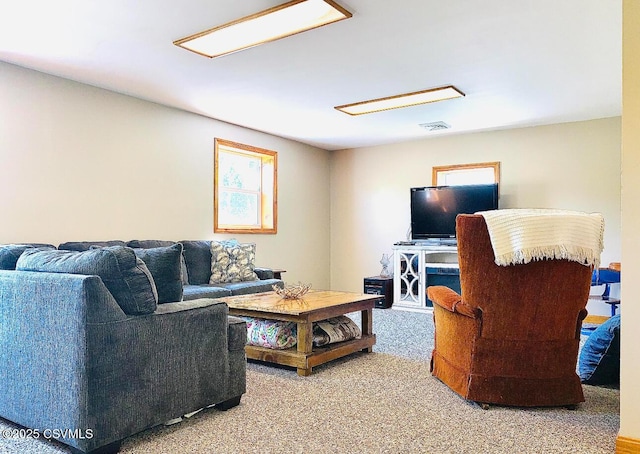 carpeted living area with visible vents