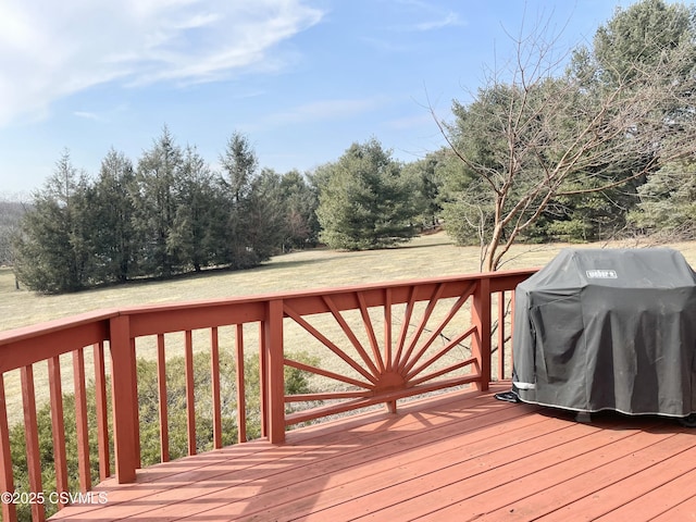 wooden deck featuring grilling area