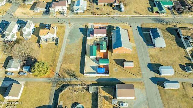 birds eye view of property with a residential view