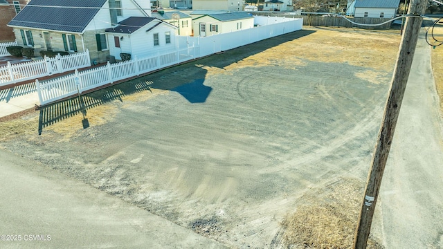 view of pool featuring fence