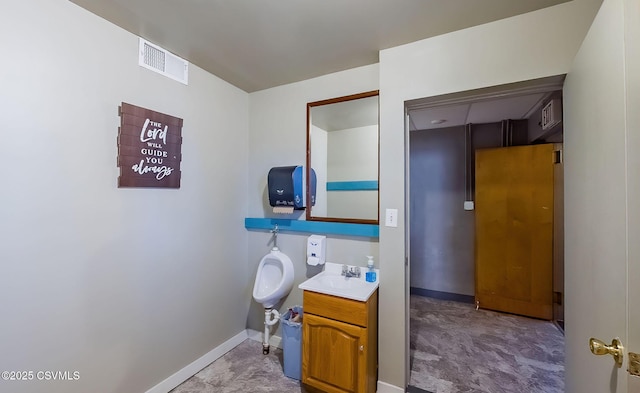 bathroom with vanity, baseboards, and visible vents