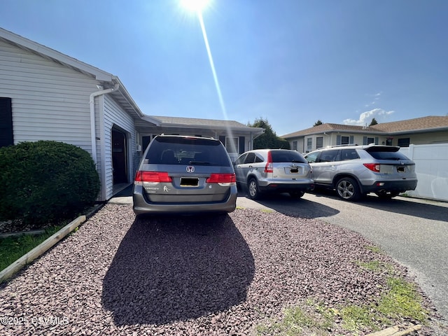 view of car parking featuring driveway