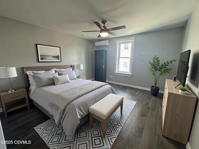 bedroom featuring dark wood-style floors, ceiling fan, a wall mounted air conditioner, and baseboards