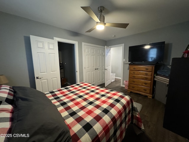 bedroom featuring a closet, dark wood-style flooring, and ceiling fan