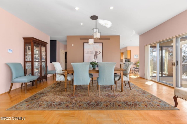 dining room with recessed lighting