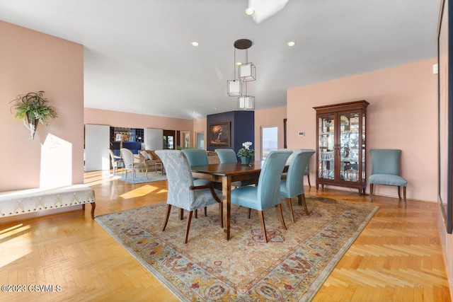 dining room featuring recessed lighting