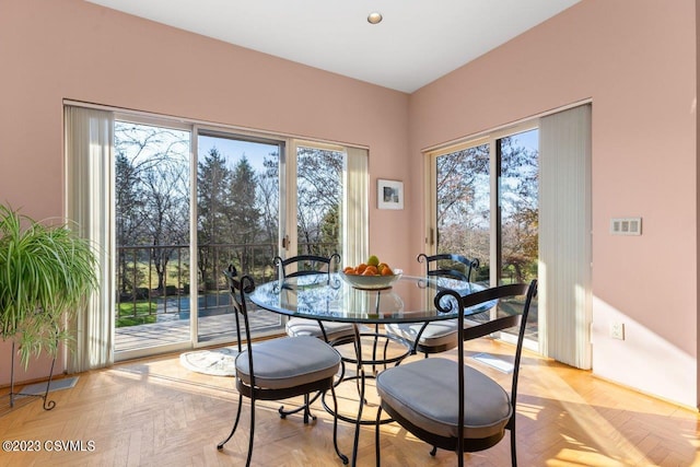 dining area featuring recessed lighting