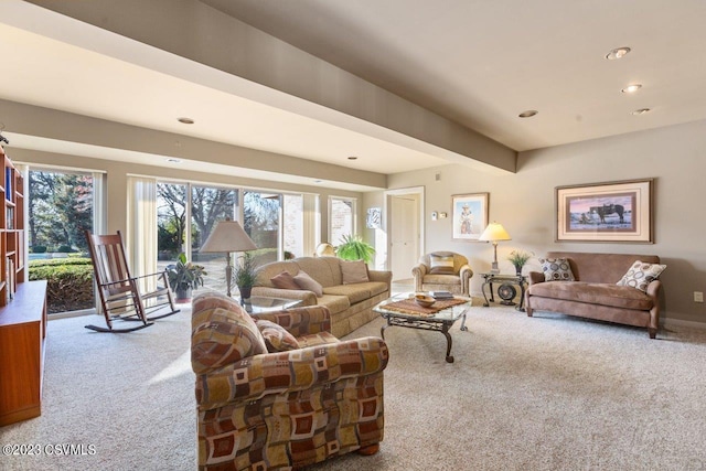 carpeted living area featuring recessed lighting, plenty of natural light, and beamed ceiling