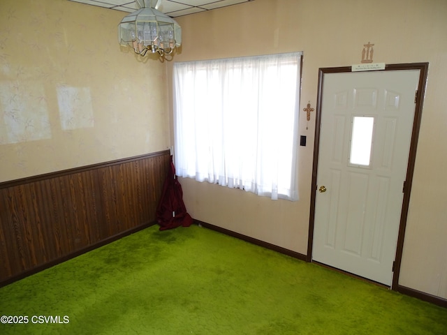 349 W 2nd St, Mount Carmel, PA 17851 - carpeted entryway with baseboards and a chandelier