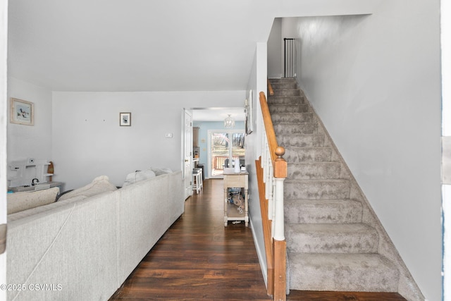 stairs with wood finished floors