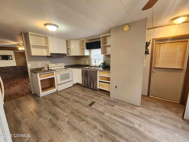 kitchen with open shelves, electric range, and ceiling fan